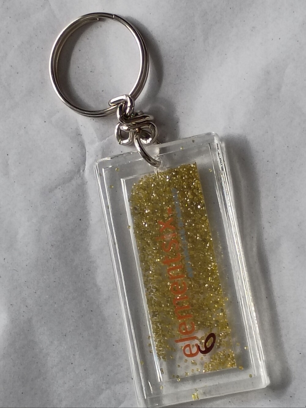 Element Six Company Gold Glitter Keychain Diamond Manufacturing Company